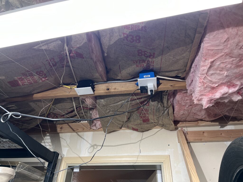 The replacement - a junction box, proper wire connectors, and a new 14/2 wire joining the two halves of the cable together. Oh, and a properly installed socket for lightning. 